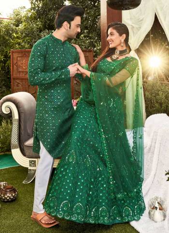 Grab These Beautiful Colored Couple Combo.These Lehenga Choli is All Over Soft Net Fabricated And PairWith Cotton Mens Wear Kurta.Its Beautified With Designer Thread,Mirror Embroidery Work. 