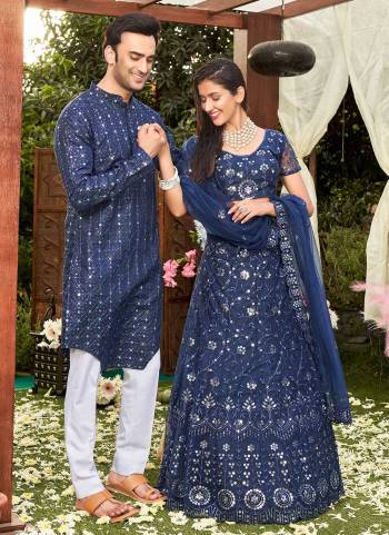 Grab These Beautiful Colored Couple Combo.These Lehenga Choli is All Over Soft Net Fabricated And PairWith Cotton Mens Wear Kurta.Its Beautified With Designer Thread,Mirror Embroidery Work. 