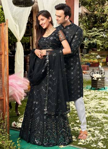 Grab These Beautiful Colored Couple Combo.These Lehenga Choli is All Over Soft Net Fabricated And PairWith Cotton Mens Wear Kurta.Its Beautified With Designer Thread,Mirror Embroidery Work. 