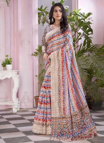 Grab These Saree in Fine Colored Pair With Blouse.These Lehenga And Blouse Are Fabricated On Georgette Brasso.Its Beautified With Hand Carved Burnouts Brasso,Printed Work.