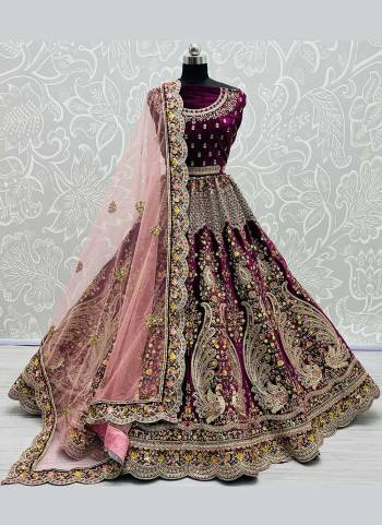 Grab These Designer Lehenga Choli in Fine Colored Pair With Blouse And Dupatta.These Blouse And Lehenga Are Fabricated On Velvet Pair With Soft Net Dupatta.Its Beautified With Heavy Dori,Thread,Jari Embroidery,Diamond Work.