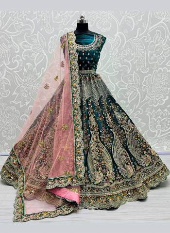 Grab These Designer Lehenga Choli in Fine Colored Pair With Blouse And Dupatta.These Blouse And Lehenga Are Fabricated On Velvet Pair With Soft Net Dupatta.Its Beautified With Heavy Dori,Thread,Jari Embroidery,Diamond Work.