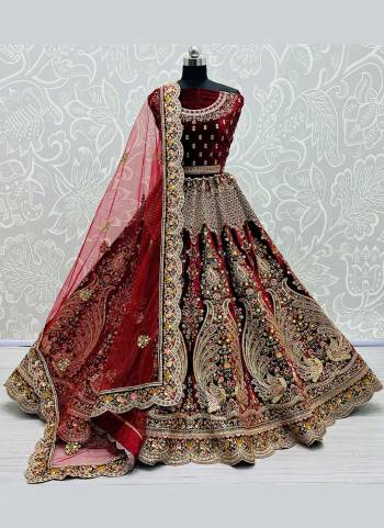 Grab These Designer Lehenga Choli in Fine Colored Pair With Blouse And Dupatta.These Blouse And Lehenga Are Fabricated On Velvet Pair With Soft Net Dupatta.Its Beautified With Heavy Dori,Thread,Jari Embroidery,Diamond Work.