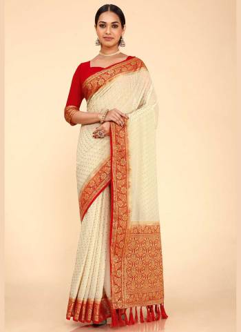 Grab These Saree in Fine Colored Pair With Blouse.These Saree and Blouse Are Fabricated On Georgette Silk.Its Beautified With Heavy Wevon Designer Work .