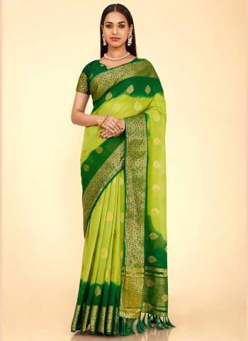 Grab These Saree in Fine Colored Pair With Blouse.These Saree And Blouse Are Fabricated On Georgette Silk.Its Beautified With Heavy Wevon Jari Designer Work .