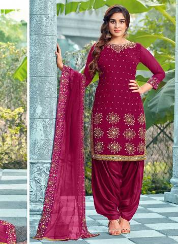 Grab These Beautiful Colored Patiala Suit Pair With Bottom And Dupatta.These Top is Fabricated On Faux Georgette Pair With Dull Santoon Bottom And Net Dupatta.Its Beautified With Real Mirror Designer Work. 