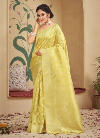 Grab These Saree in Fine Colored Pair With Blouse.These Saree and Blouse Are Fabricated On Organza.Its Beautified With Heavy Wevon Designer Work .