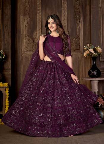 Garb These Lehenga Choli In Fine Color.These Are Net Base Lehenga Choli Fabric With Thread,Sequance Embroidery Work.