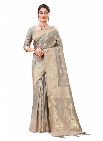 Grab These Saree in Fine Colored Pair With Blouse.These Saree and Blouse Are Fabricated On Dola Silk.Its Beautified With Heavy Wevon Designer Work .