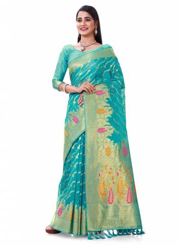 Grab These Saree in Fine Colored Pair With Blouse.These Saree and Blouse Are Fabricated On Organza.Its Beautified With Heavy Wevon Designer Work .