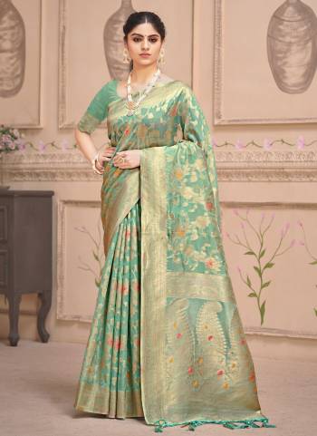 Grab These Saree in Fine Colored Pair With Blouse.These Saree and Blouse Are Fabricated On Organza.Its Beautified With Heavy Designer Woven Zari Work .