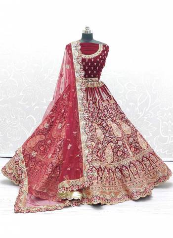 For A Bridal Look,Grab These Heavy Designer Lehenga Choli in Fine Colored.These Lehenga And Blouse Are Fabricated On Velvet Pair With Soft Net Dupatta.Its Beautified With  Patch,Multy Thread,Jari,Dori Embroidery,Diamond Work.