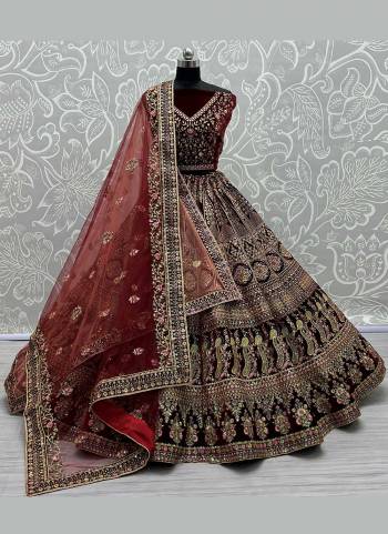 For A Bridal Look,Grab These Heavy Designer Lehenga Choli in Fine Colored.These Lehenga And Blouse Are Fabricated On Velvet Pair With Soft Net Dupatta.Its Beautified With  Patch,Multy Thread,Jari,Dori Embroidery,Diamond Work.