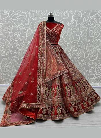 For A Bridal Look,Grab These Heavy Designer Lehenga Choli in Fine Colored.These Lehenga And Blouse Are Fabricated On Velvet Pair With Soft Net Dupatta.Its Beautified With  Patch,Multy Thread,Jari,Dori Embroidery,Diamond Work.