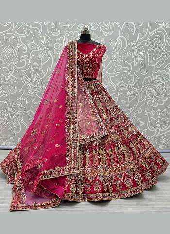 For A Bridal Look,Grab These Heavy Designer Lehenga Choli in Fine Colored.These Lehenga And Blouse Are Fabricated On Velvet Pair With Soft Net Dupatta.Its Beautified With  Patch,Multy Thread,Jari,Dori Embroidery,Diamond Work.