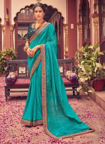 Grab These Beautiful Colored Saree Pair With Blouse.These Saree is Fabricated On Vichitra Silk Pair With Phantom Silk Blouse.Its Beautified With Crush Saree,Jari,Resham Embroidery Work.