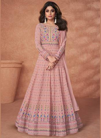 Grab These Suit in Beatiful Colored Pair With Bottom And Dupatta.These Top And Dupatta Are Fabricated On Georgette Pair With Santon Bottom.Its Beautified With Heavy Multy Thread Embroidery Work.