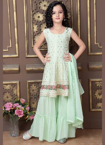 Grab These Readymade Kids Wear in Fine Colored.Its Come With All Over Faux Georgette Fabricated And Heavy Thread Embroidery Work.