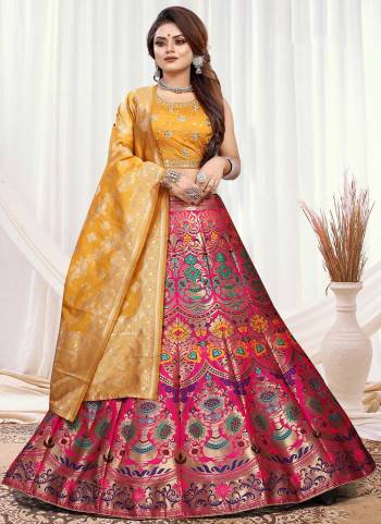 Grab These Beautiful Lehenga In Fine Colored.These Lehenga And Dupatta Are Fabricated On Banarasi Silk Pair With Modal Chanderi Blouse.Its Beautified With  Wevon Designer,Embroidery Work. 