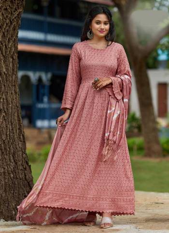 For A Bold And Beautuful Look,Grab These Readymade Kurti In Fine Colored.These kurti is Fabricated On Rayon Pair With Viscose Dupatta.Its Beautified With Chikan Embroidery And Golden Stripe Work.