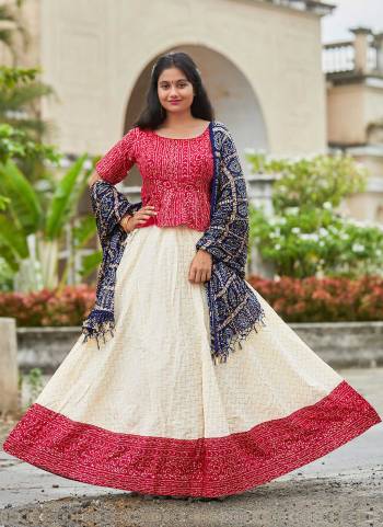 For A Different Look,Grab These Readymade Lehenga Choli in Fine Colored.These Lehenga And Blouse Are Fabricated On Cotton Satin Pair With Muslin Dupatta.Its Beautified WIth Bandhej Printed Designer Work.