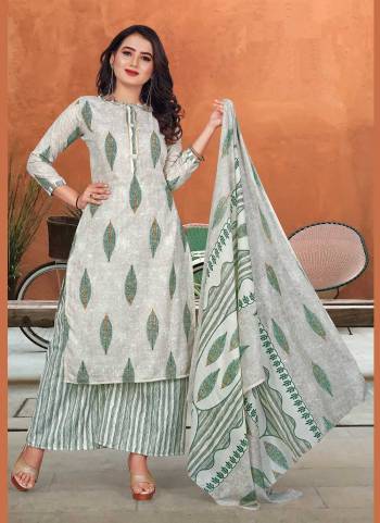 Grab These Beautiful Colored Suit.These Top And Bottom Are Fabricated On Cotton Pair With Chiffon Dupatta.Its Beautified With  Digital Printed Work.