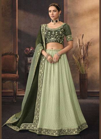 For A Designer Look,GrabThese Lehenga Choli in Fine Colored.These Lehenga And Dupatta Are Fabricated On Chinon Pair With Phantom Silk Blouse.Its Beautified With  Printed,Resham,Jari,Mirror,Sequance Embroidery Work.