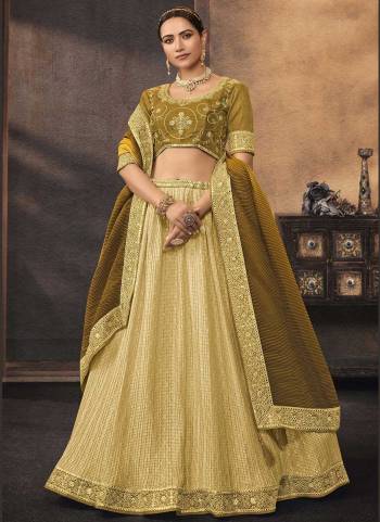 For A Designer Look,GrabThese Lehenga Choli in Fine Colored.These Lehenga And Dupatta Are Fabricated On Chinon Pair With Phantom Silk Blouse.Its Beautified With  Printed,Resham,Jari,Mirror,Sequance Embroidery Work.