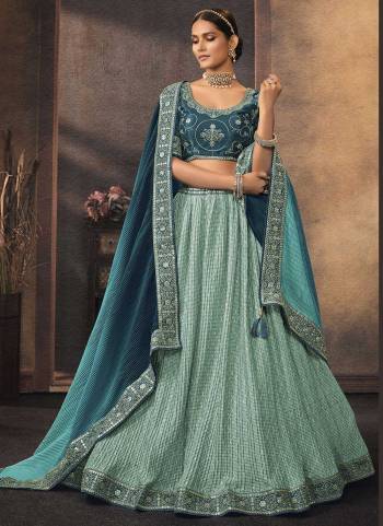 For A Designer Look,GrabThese Lehenga Choli in Fine Colored.These Lehenga And Dupatta Are Fabricated On Chinon Pair With Phantom Silk Blouse.Its Beautified With  Printed,Resham,Jari,Mirror,Sequance Embroidery Work.