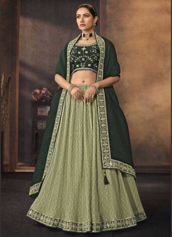 For A Designer Look,GrabThese Lehenga Choli in Fine Colored.These Lehenga And Dupatta Are Fabricated On Chinon Pair With Phantom Silk Blouse.Its Beautified With  Printed,Resham,Jari,Mirror,Sequance Embroidery Work.