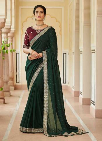 Grab These Fine Colored Saree Pair With Blouse.These Saree is Fabricated On Vichitra Silk Pair With Banglori Silk Blouse.Its Beautified With Resham,Jari,Dori,Sequance Embroidery,Swarovski Work.