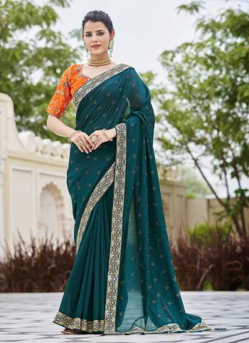 Grab These Fine Colored Saree Pair With Blouse.These Saree is Fabricated On Vichitra Silk Pair With Banglori Silk Blouse.Its Beautified With Resham,Jari,Dori,Sequance Embroidery,Swarovski Work.