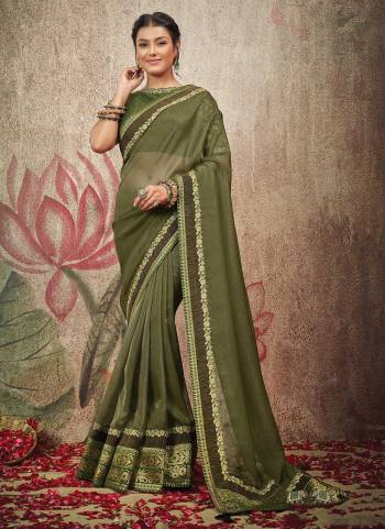 For A Bold And Beautiful Look,GrabThese Saree in Fine Colored.These Saree is Fabricated On Net Organza Pair With Raw Silk Blouse.Its Beautified With Heavy Designer Work.