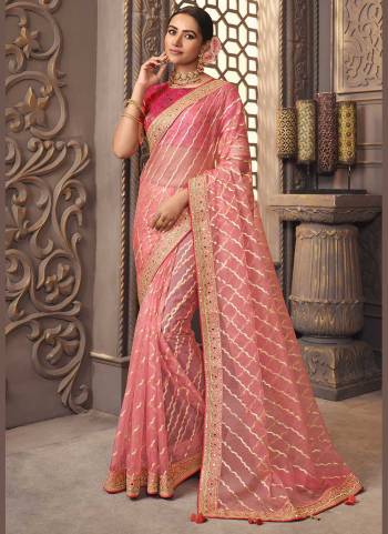 For A Designer Look,Grab These Saree in Fine Colored Pair With Blouse.These Saree is Fabricated On Organza Pair With Banarasi Silk Blouse.Its Beautified With Designer Work.