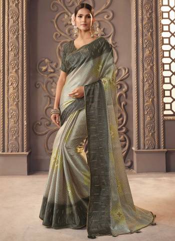 For A Designer Look,Grab These Saree in Fine Colored Pair With Blouse.These Saree is Fabricated On Organza Silk Pair With Cotton Silk Blouse.Its Beautified With Designer Work.