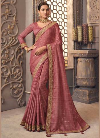 For A Designer Look,Grab These Saree in Fine Colored Pair With Blouse.These Saree is Fabricated On Jute Checks  Pair With Cotton Silk Blouse.Its Beautified With Designer Work.