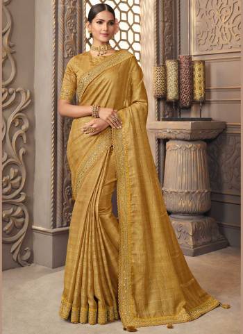 For A Designer Look,Grab These Saree in Fine Colored Pair With Blouse.These Saree is Fabricated On Jute Checks  Pair With Cotton Silk Blouse.Its Beautified With Designer Work.