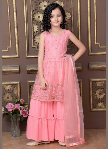 Grab These Readmade Kids Wear Sharara Suit in Fine Colored.These Top And Dupatta Are Fabricated On Net Pair With Faux Georgette Sharara.Its Beautified With Heavy Thread,Sequance Embroidery Work.