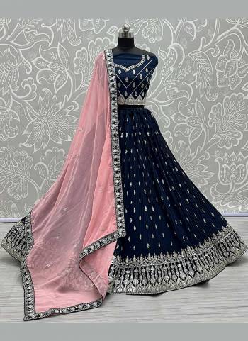 Grab These Beautiful Looking Lehenga Choli in Fine Colored.These Lehenga And Blouse Are Fabricated On Georgette Pair With Georgette Blouse.Its Beautified With German Jari, Multi Thread Embroidery Work.