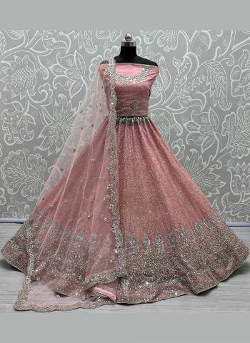 For A Designer Look,Grab These Lehenga Choli in Fine Colored Pair With Blouse And Dupatta.These Blouse And Lehenga Are Fabricated On Net Pair With Soft Net Dupatta.its Beautified With Designer Mirror,Jari,Fancy Embroidery Work