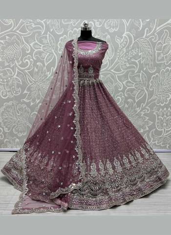 For A Designer Look,Grab These Lehenga Choli in Fine Colored Pair With Blouse And Dupatta.These Blouse And Lehenga Are Fabricated On Net Pair With Soft Net Dupatta.its Beautified With Designer Mirror,Jari,Fancy Embroidery Work