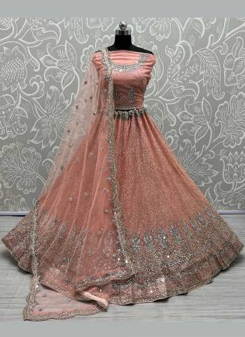 For A Designer Look,Grab These Lehenga Choli in Fine Colored Pair With Blouse And Dupatta.These Blouse And Lehenga Are Fabricated On Net Pair With Soft Net Dupatta.its Beautified With Designer Mirror,Jari,Fancy Embroidery Work