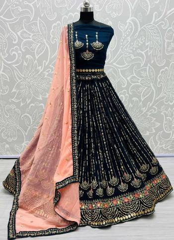 Grab These Beautiful Looking Lehenga Choli in Fine Colored.These Lehenga And Blouse Are Fabricated On Georgette Pair With Georgette Blouse.Its Beautified With German Jari, Multi Thread Embroidery Work.