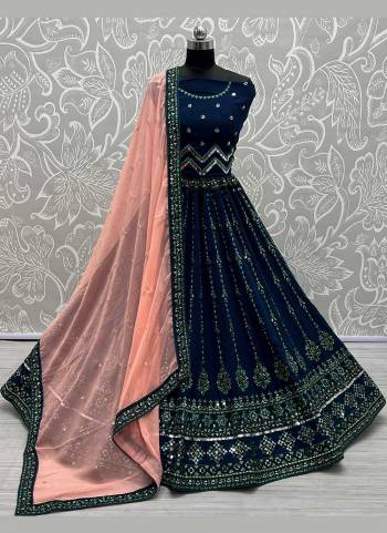 Grab These Beautiful Looking Lehenga Choli in Fine Colored.These Lehenga And Blouse Are Fabricated On Georgette Pair With Georgette Blouse.Its Beautified With German Jari, Multi Thread Embroidery Work.