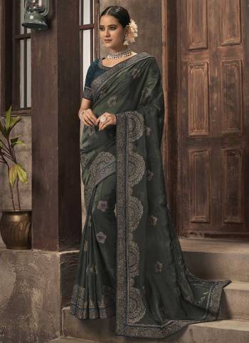 For A Different Look,Grab These Fine Colored Saree.These Saree is Fabricated On Organza Pair With Phantom Silk Blouse.Its Beautified With Jari Embroidery,Swaroski Work. 