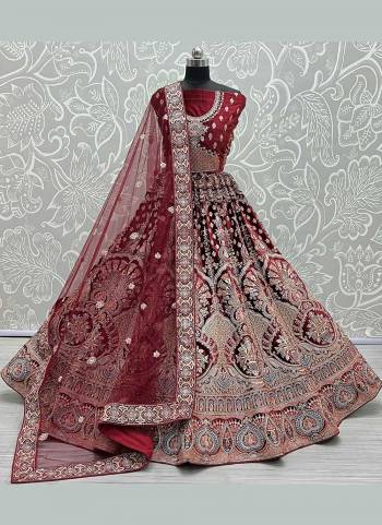 For A Rich And Designer Look,Grab These Lehenga Choli in Fine Colored Pair With Designer Blouse And Dupatta.These Lehenga And Blouse Are Fabricated On Velvet Pair With Soft Net Dupatta.Its Beautified With Heavy Designer Work.