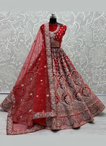 For A Rich And Designer Look,Grab These Lehenga Choli in Fine Colored Pair With Designer Blouse And Dupatta.These Lehenga And Blouse Are Fabricated On Velvet Pair With Soft Net Dupatta.Its Beautified With Heavy Designer Work.