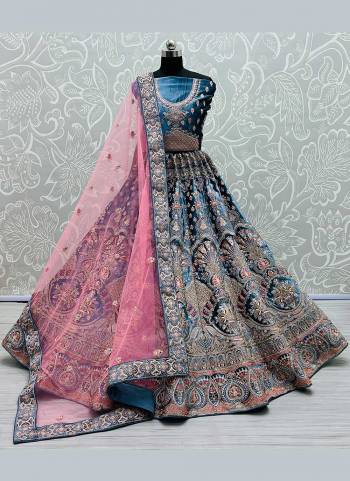 For A Rich And Designer Look,Grab These Lehenga Choli in Fine Colored Pair With Designer Blouse And Dupatta.These Lehenga And Blouse Are Fabricated On Velvet Pair With Soft Net Dupatta.Its Beautified With Heavy Designer Work.