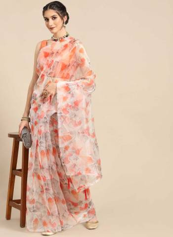 Grab These Casual Wear Saree in Fine Colored Pair With Blouse.These Saree is Fabricated On Organza Pair With Art Silk Blouse.Its Beautified With Designer Printed Work.