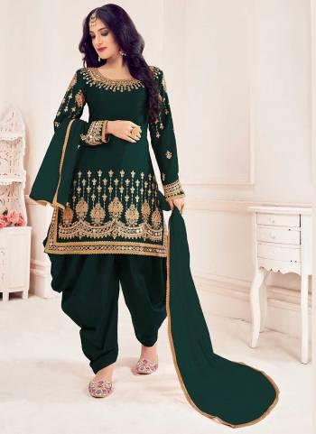 Grab These Beautiful Colored Suit.These Top is Fabricated On Faux Georgette Pair With Santoon Bottom And Soft Net Dupatta.Its Beautified With Heavy Mirror Embroidery Work.